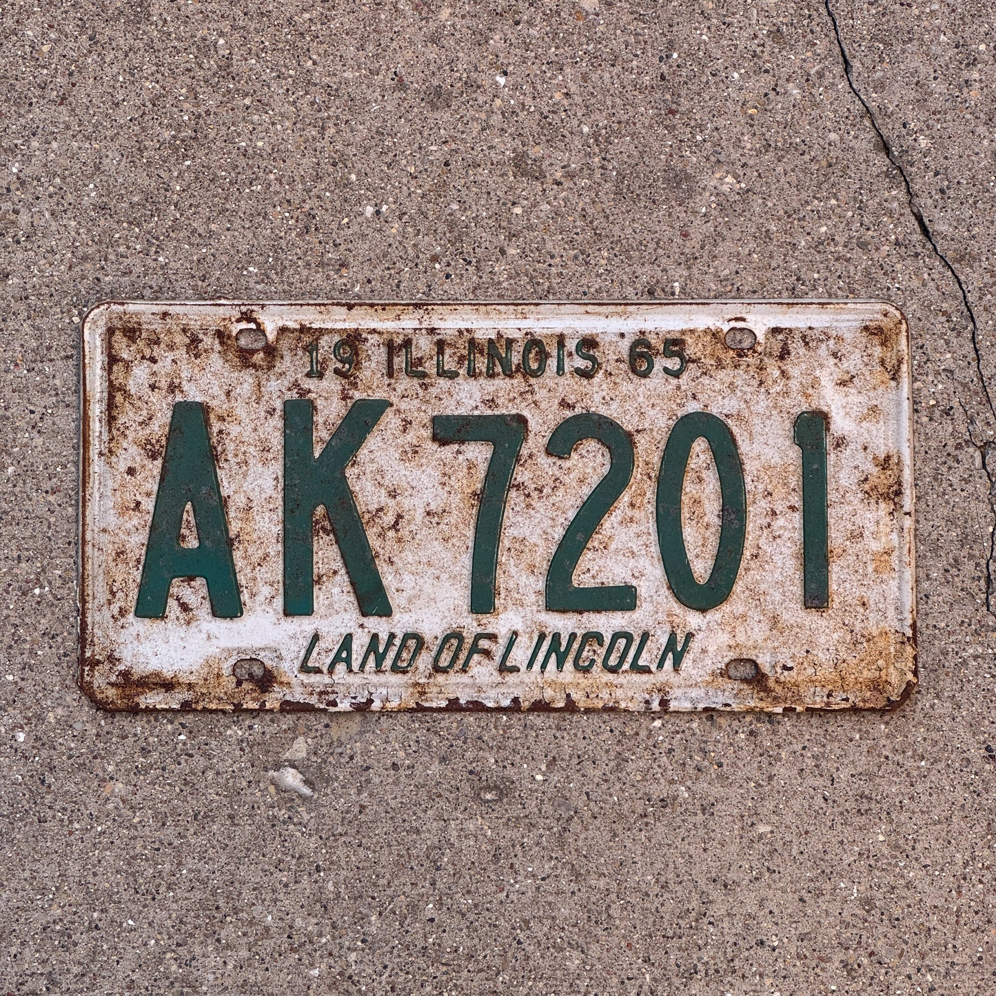 Photo of a 1965 Illinois License Plate Auto Tag Garage Decor Vintage AK 7201 with original patina