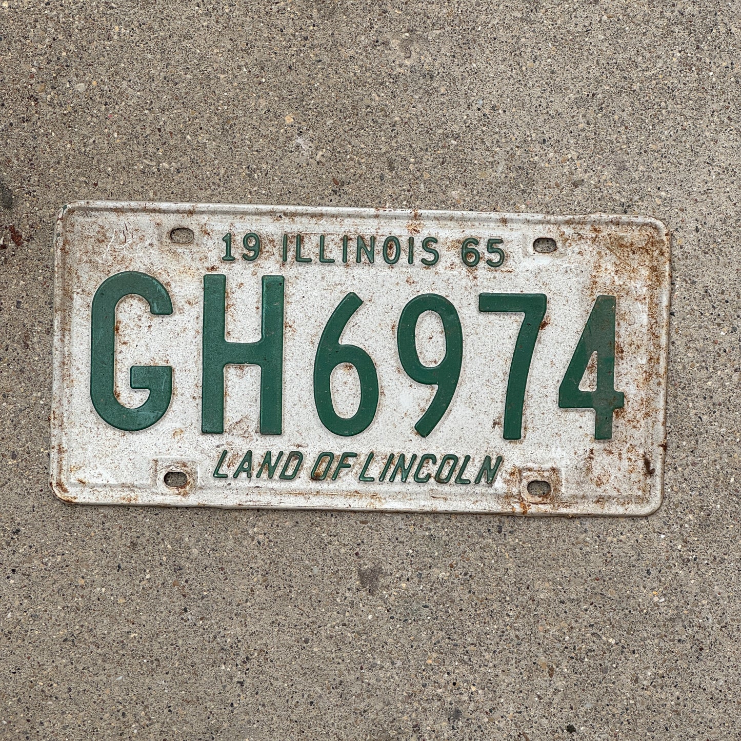 Photo of a 1965 Illinois License Plate Auto Tag Garage Decor Vintage GH 6974 with original patina