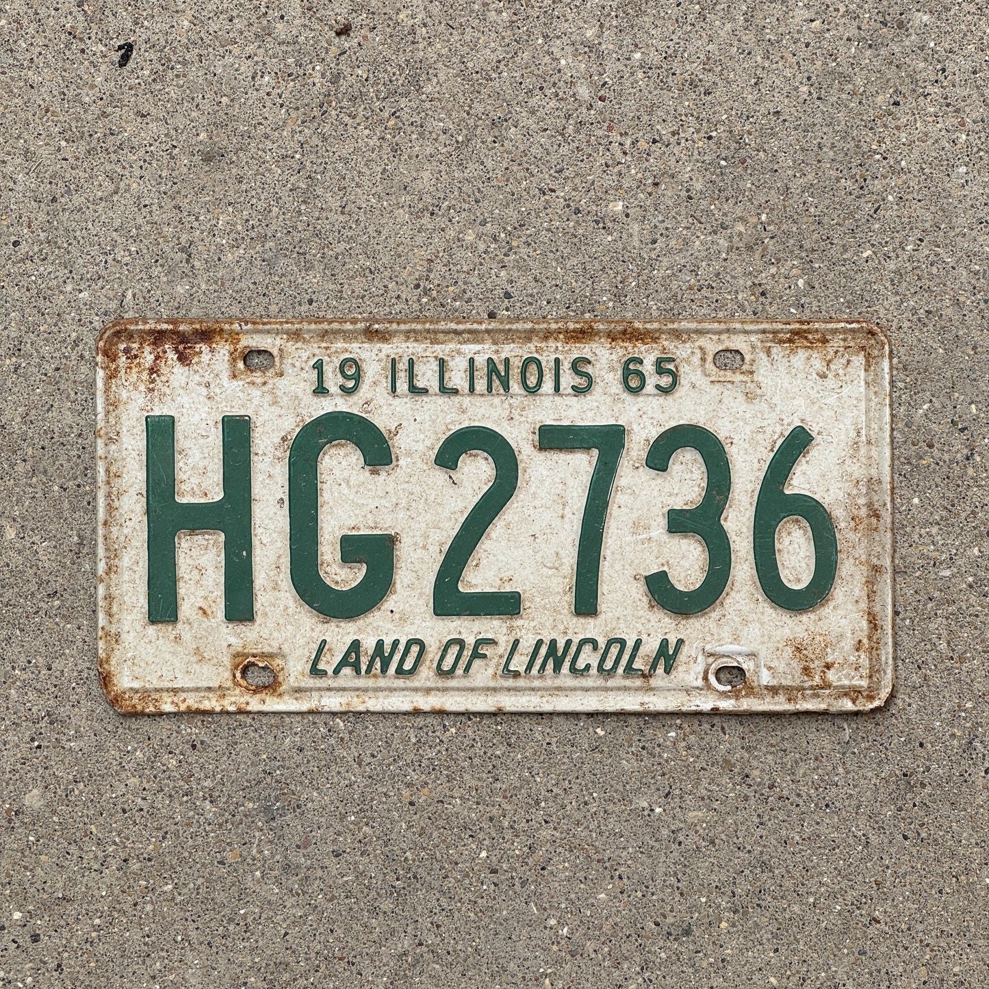 Photo of a 1965 Illinois License Plate Auto Tag Garage Decor Vintage HG 2736 with original patina