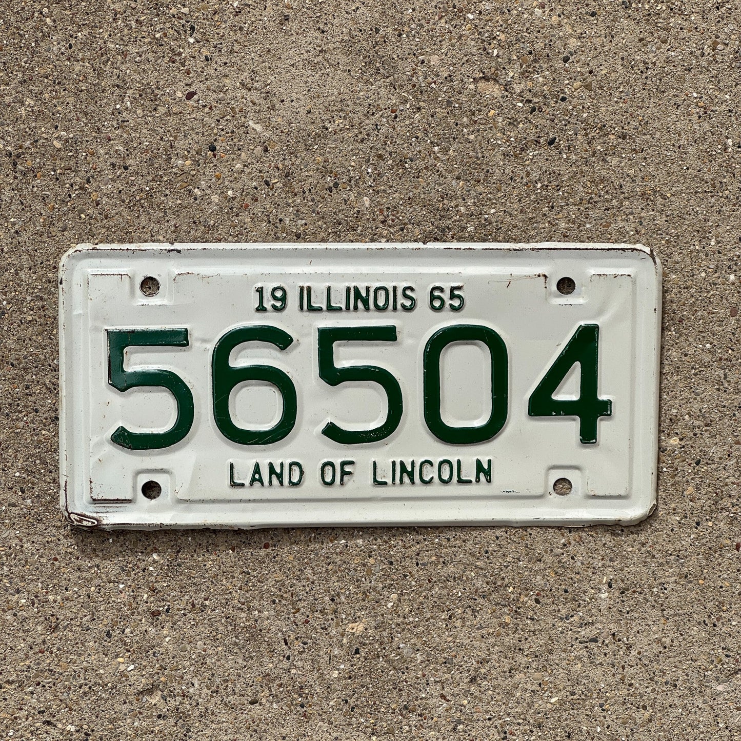 Photo of a 1965 Illinois Motorcycle License Plate Auto Tag Garage Decor Vintage 56504