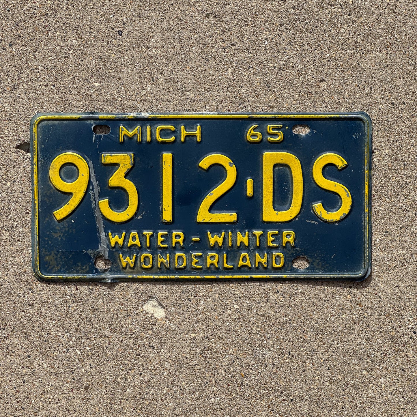 Photo of a 1965 Michigan Commercial Truck License Plate Auto Tag Garage Decor Vintage 9312 DS