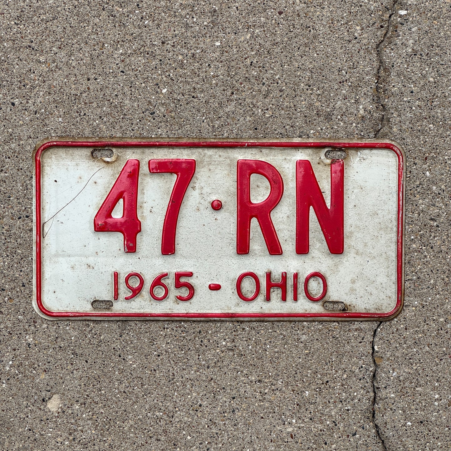 Photo of a 1965 Ohio License Plate Auto Tag Garage Decor Vintage Nurse Gift 47 RN with original patina
