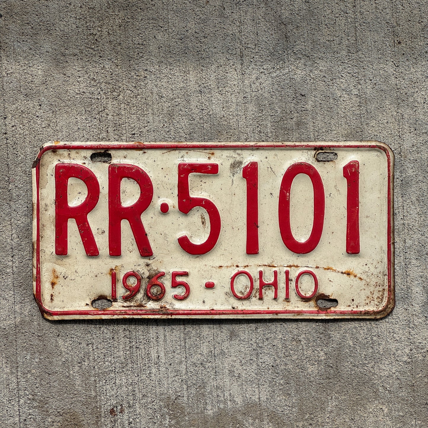 Photo of a 1965 Ohio License Plate Auto Tag Garage Decor Vintage RR 5101 with original patina