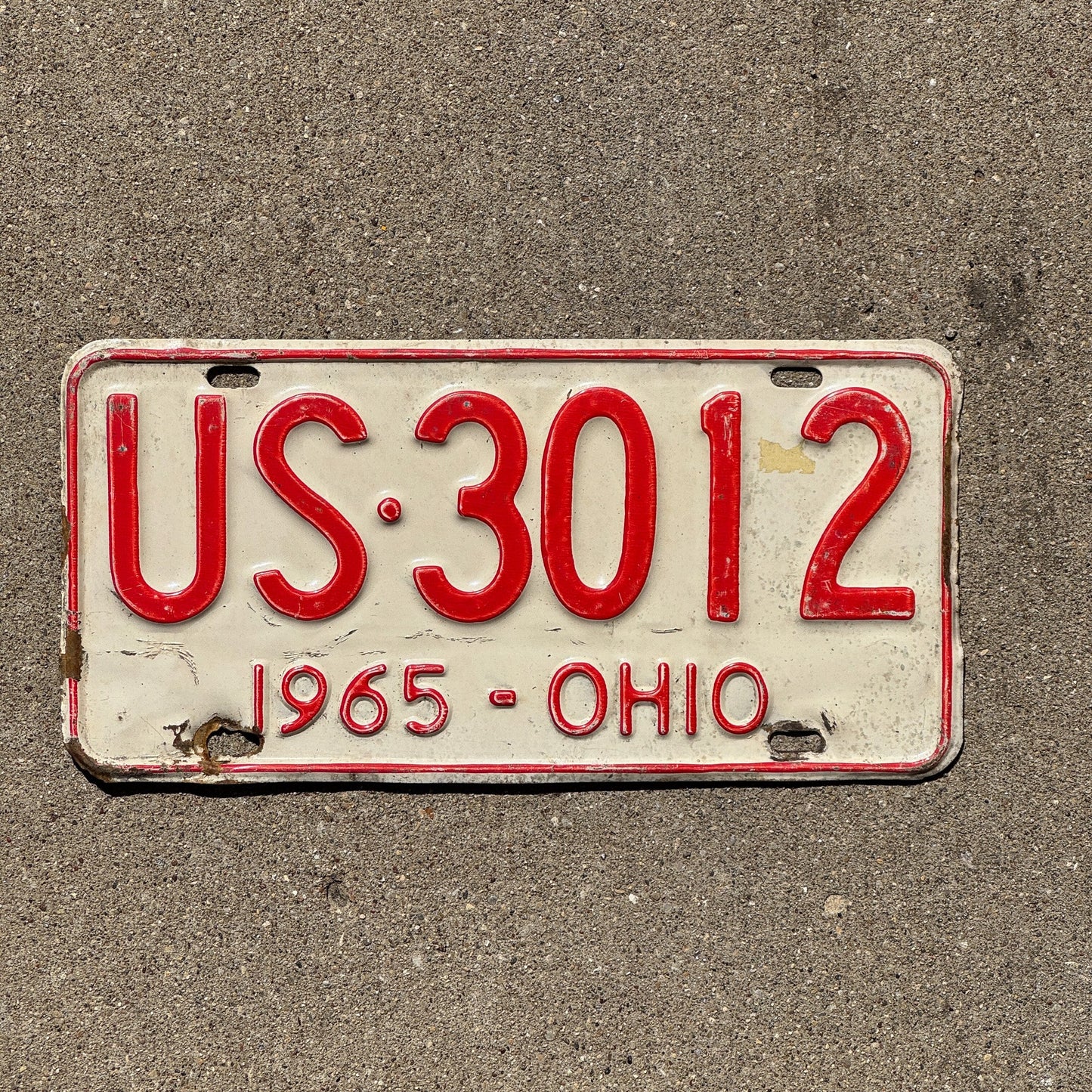 Photo of a 1965 Ohio License Plate Auto Tag Garage Decor Vintage USA America US 3012
