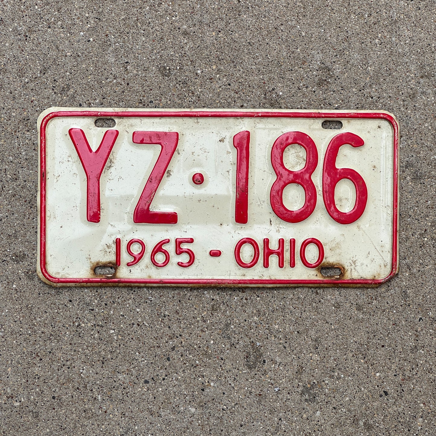 Photo of a 1965 Ohio License Plate Auto Tag Garage Decor Vintage YZ 186 with original patina