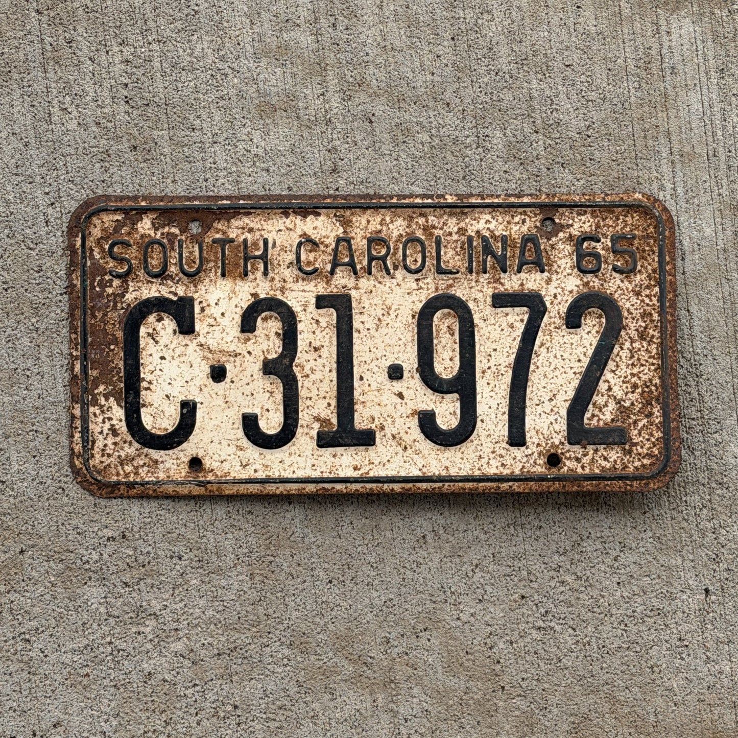 Photo of a 1965 South Carolina License Plate Auto Tag Garage Decor Vintage C 31 972 with original patina