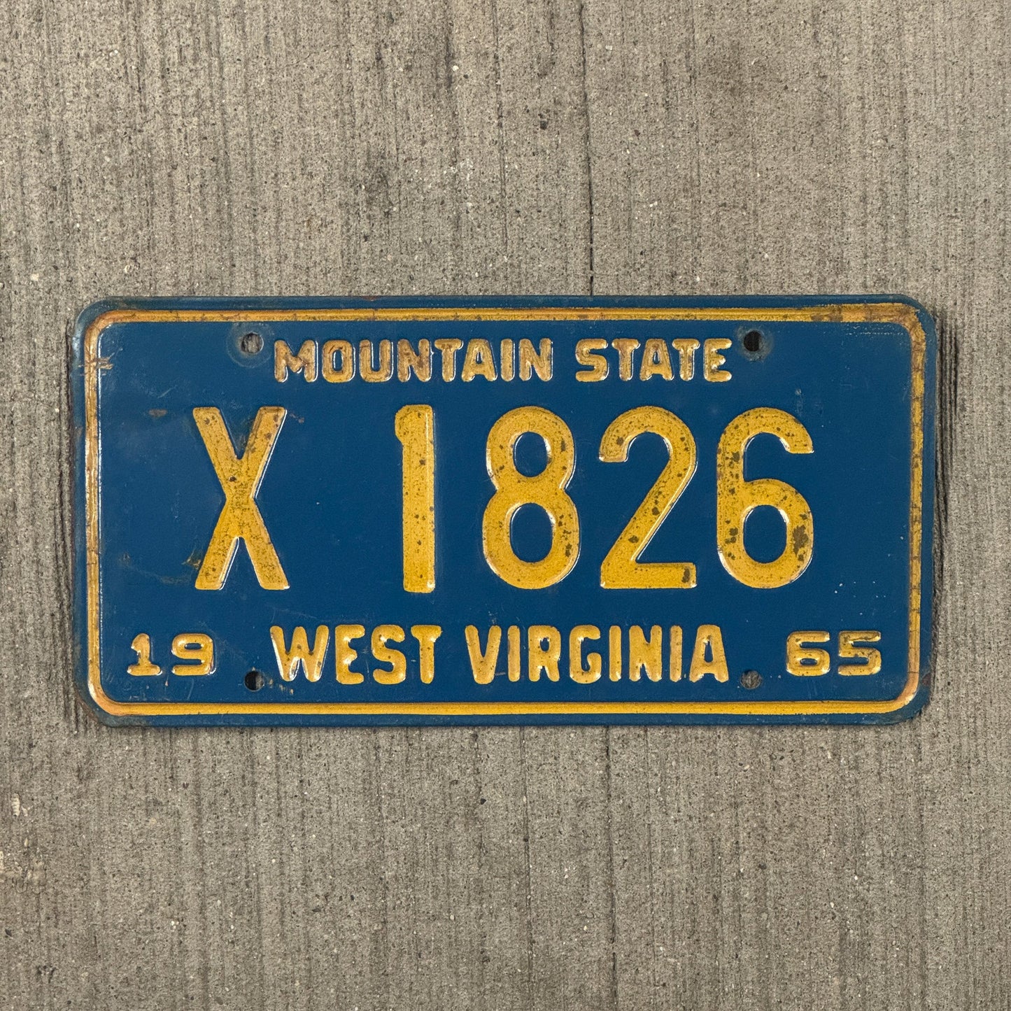 Photo of a 1965 West Virginia Farm License Plate Auto Tag Garage Decor Vintage X 1826 with original patina