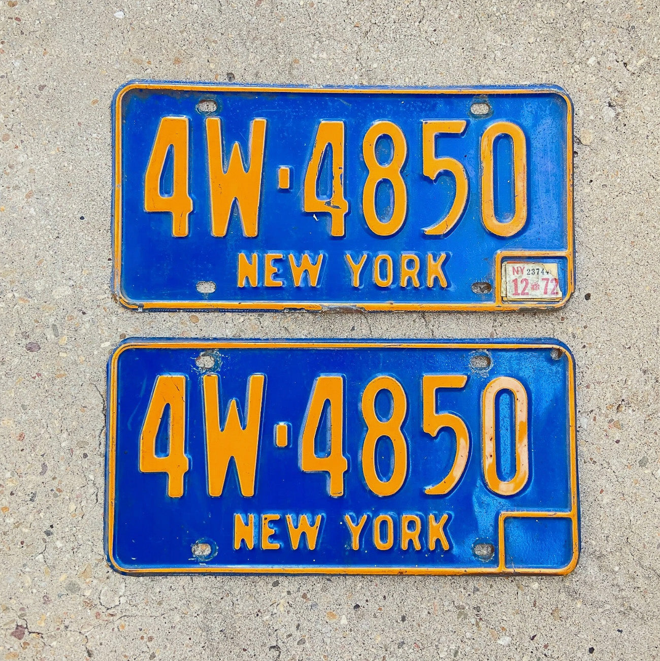 Photo of a 1966 1973 New York License Plate Pair Auto Tag Garage Decor Vintage YOM DMV Clear 4W 4850 with original patina