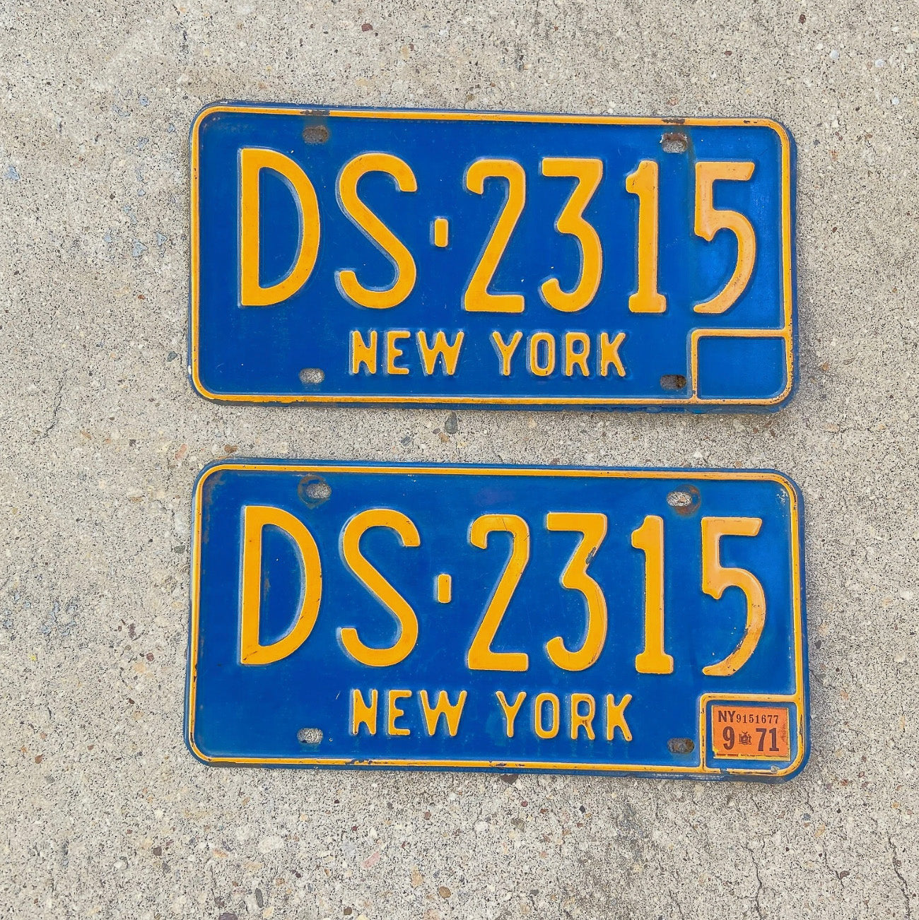 Photo of a 1966 1973 New York License Plate Pair Auto Tag Garage Decor Vintage YOM DMV Clear DS 2315 with original patina