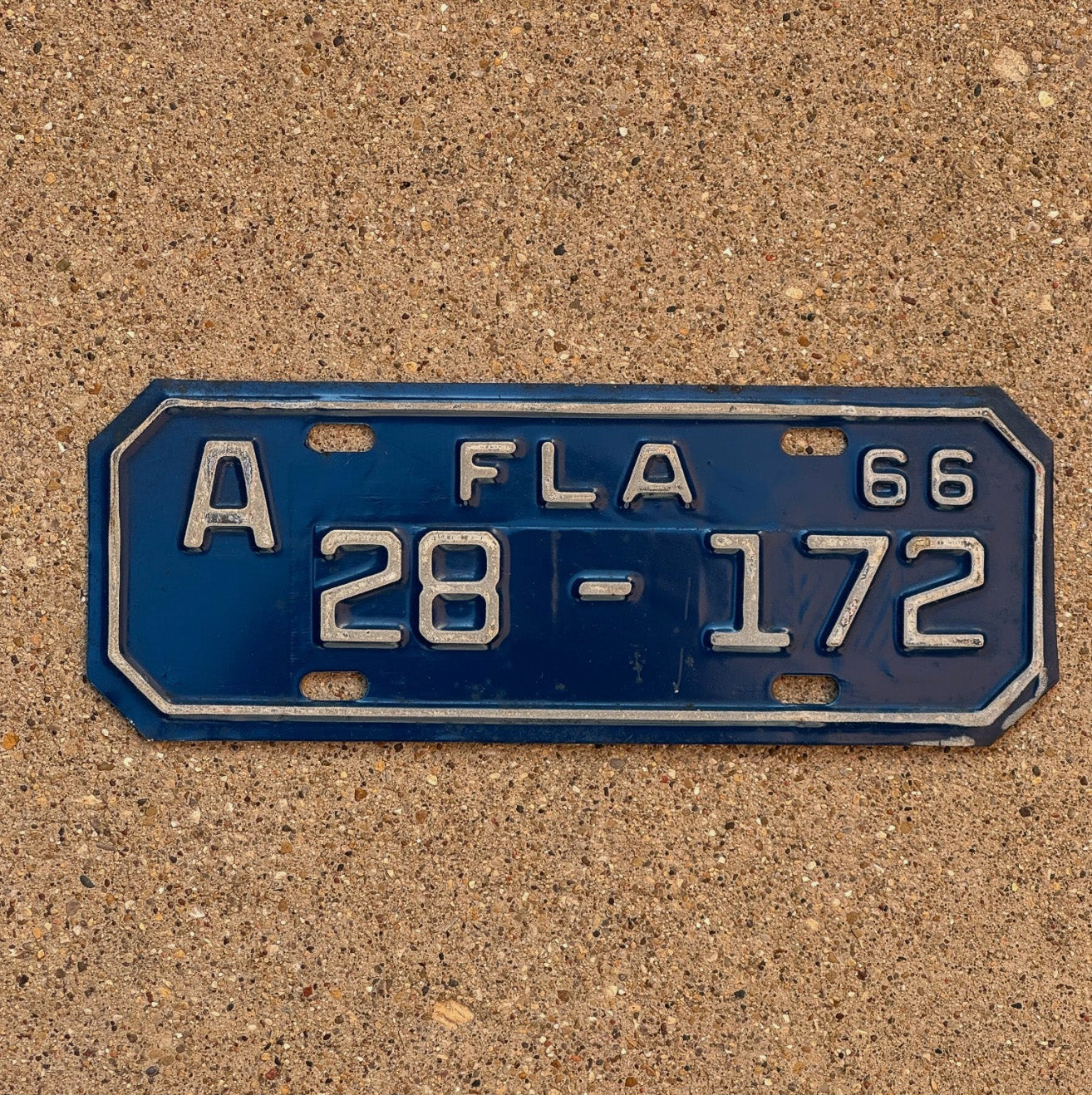 Photo of a 1966 Florida Motorcycle License Plate Auto Tag Garage Decor Vintage Pasco County 3 Digit 28 172 with original patina