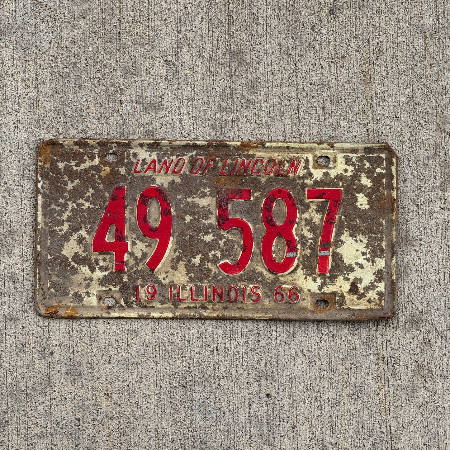 Photo of a 1966 Illinois License Plate Auto Tag 1 Vintage Garage 49 587 with original patina