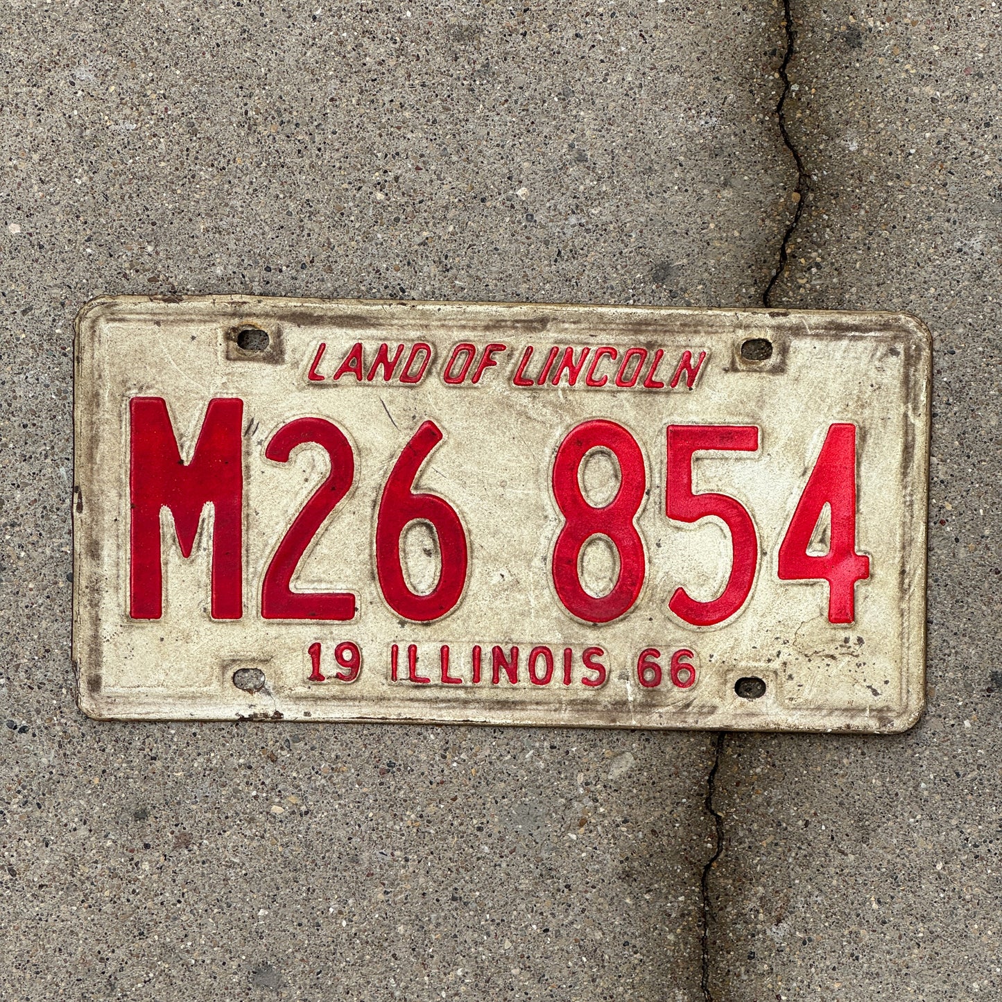 Photo of a 1966 Illinois Municipal License Plate Auto Tag 1 Vintage Garage M 26 854 with original patina