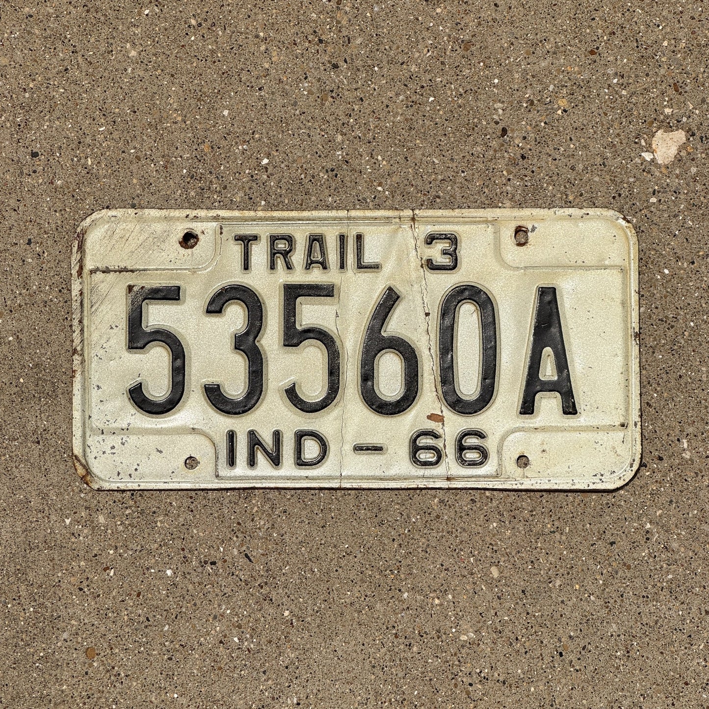 Photo of a 1966 Indiana Trailer License Plate Auto Tag Garage Decor Vintage 53560 A