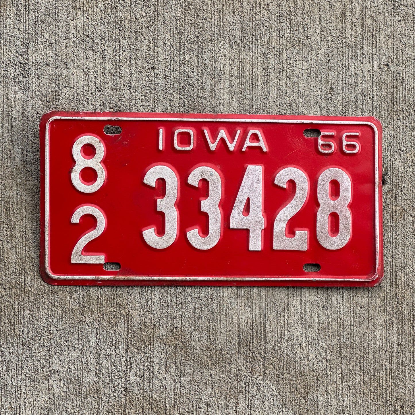 Photo of a 1966 Iowa License Plate Auto Tag Garage Decor Vintage 82 33428 with original patina