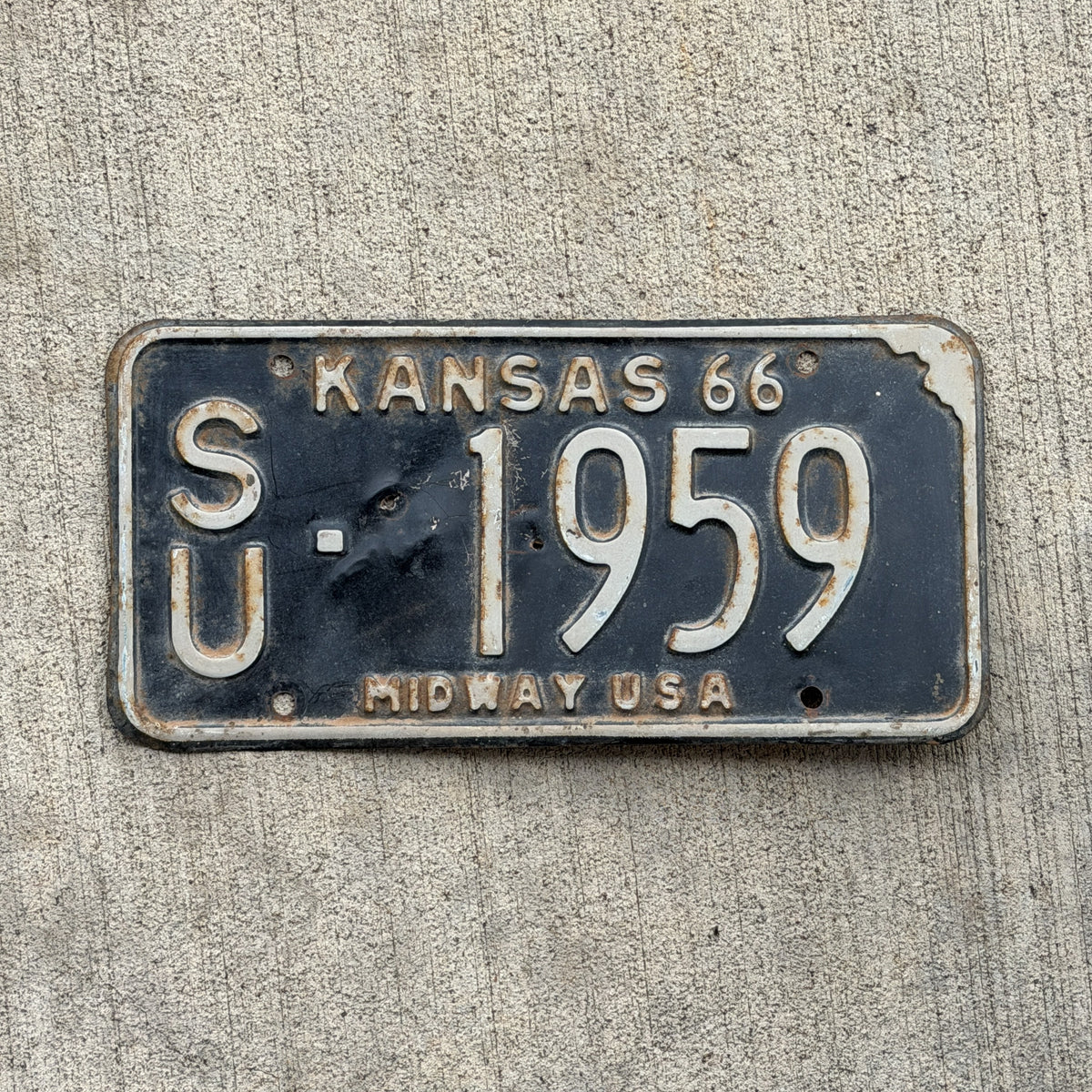 Photo of a 1966 Kansas License Plate Auto Tag Garage Decor Vintage SU 1959 with original patina