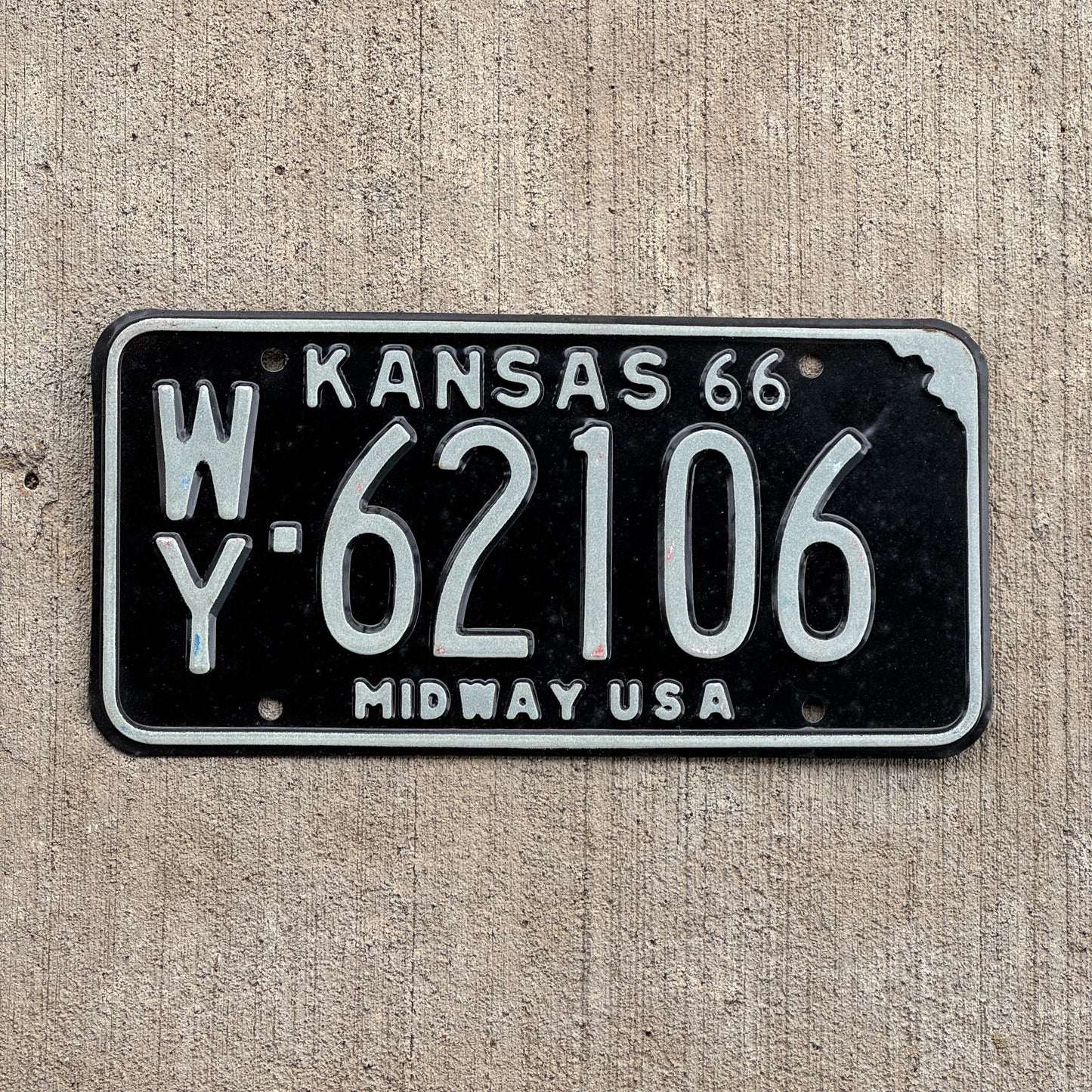 Photo of a 1966 Kansas License Plate Auto Tag Garage Decor Vintage WY 62106 with original patina