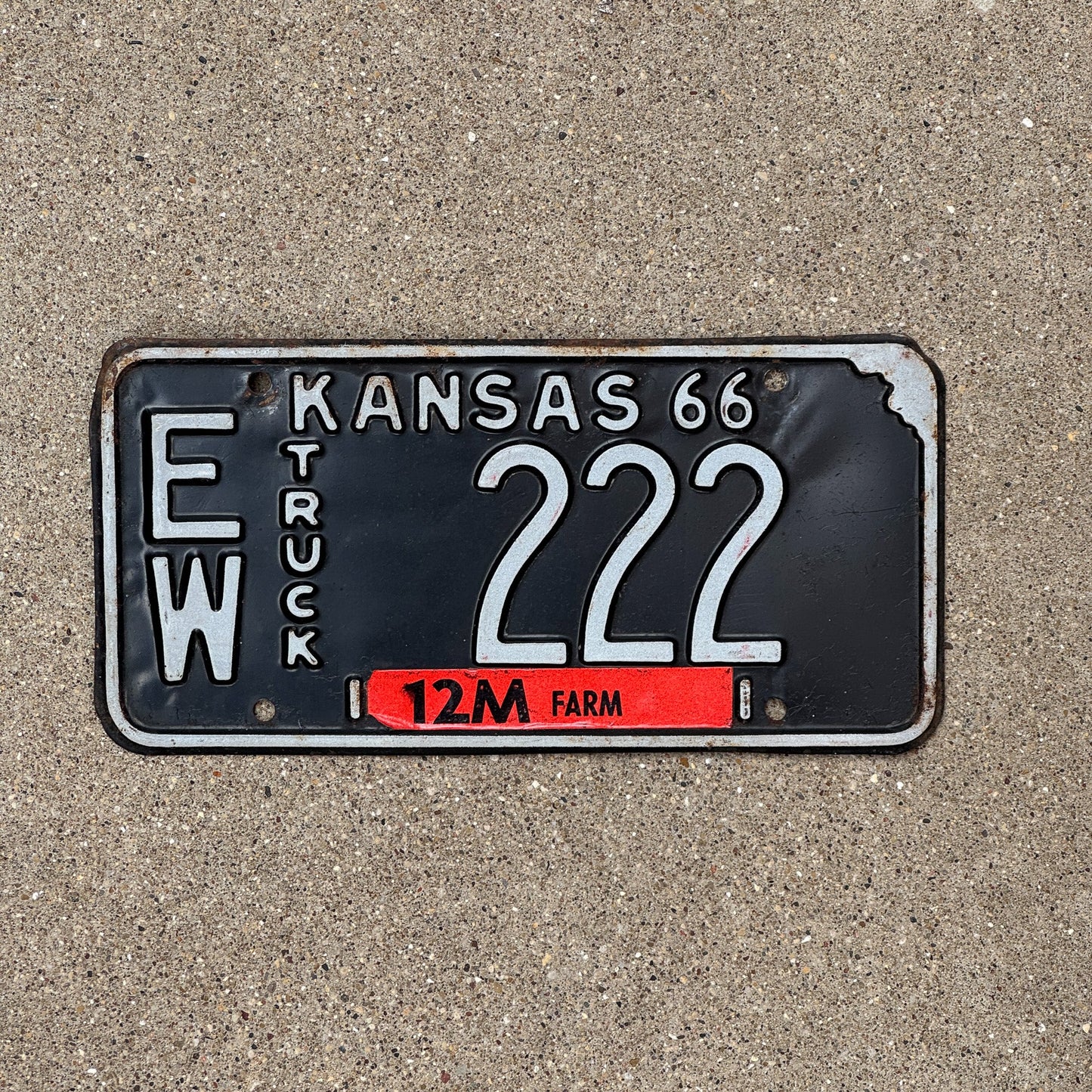 Photo of a 1966 Kansas Truck License Plate Auto Tag Garage Decor Vintage Repeat Repeating EW 222