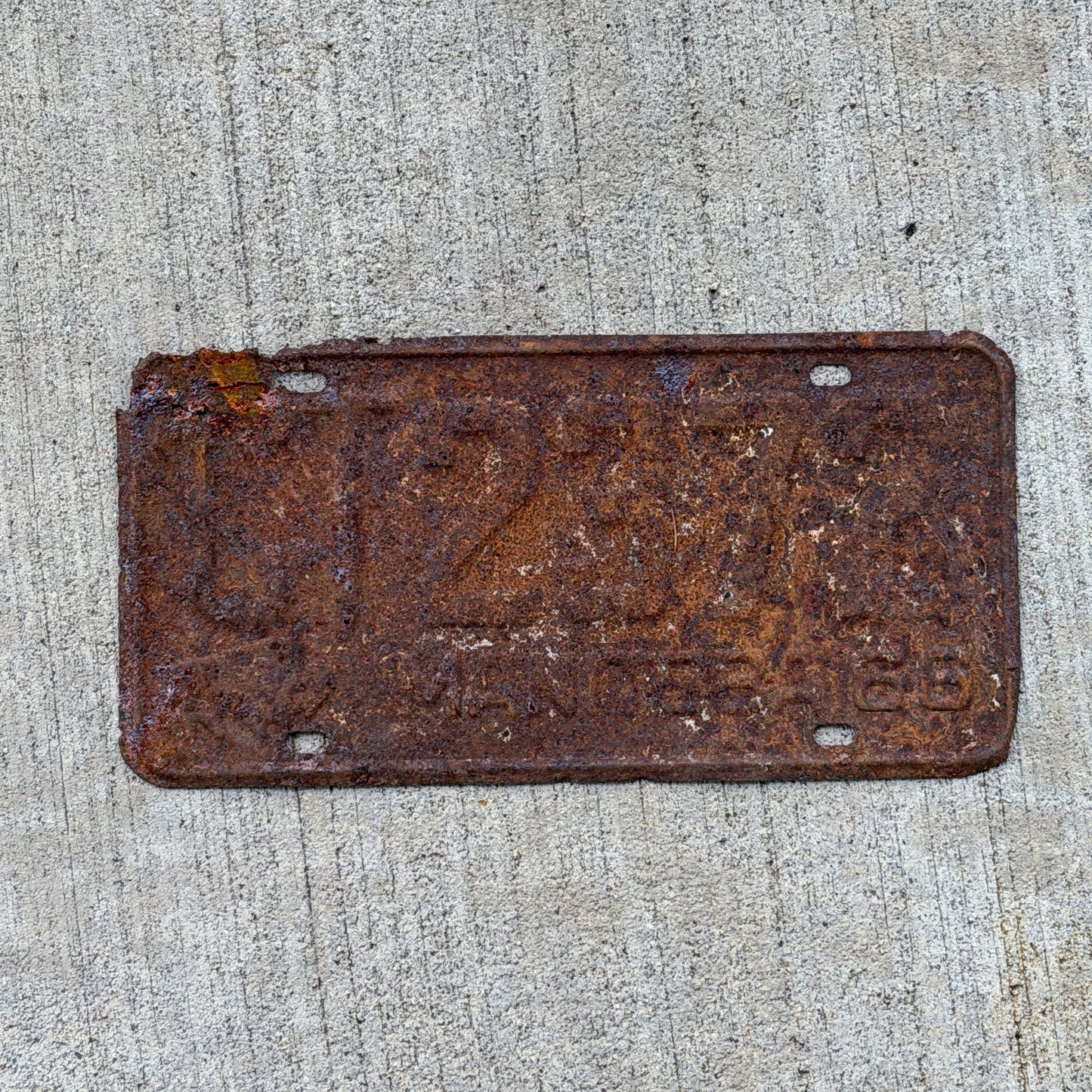Photo of a 1966 Manitoba Commercial License Plate Auto Tag Garage Decor Vintage CT 2372 with original patina