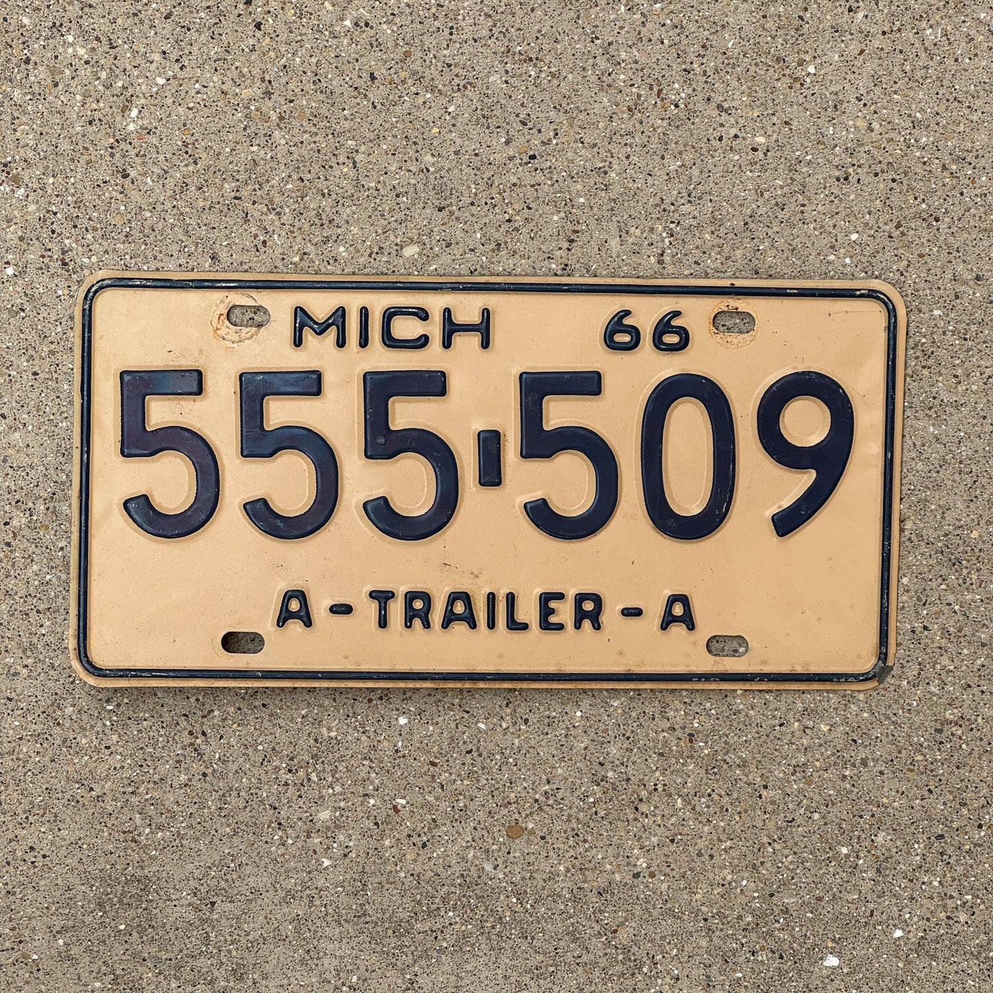 Photo of a 1966 Michigan A Trailer License Plate Auto Tag Garage Decor Vintage Repeat Repeating 555 509