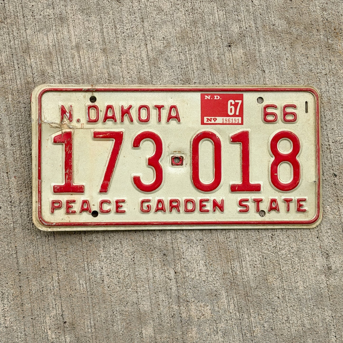 Photo of a 1966 North Dakota License Plate Auto Tag Garage Decor Vintage 173 018 with original patina