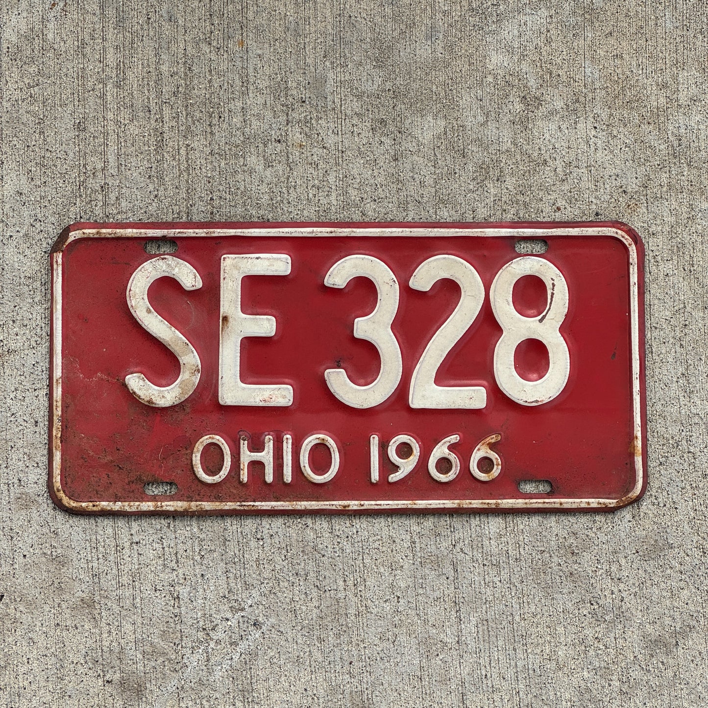 Photo of a 1966 Ohio License Plate Auto Tag Garage Decor Vintage SE 328 with original patina