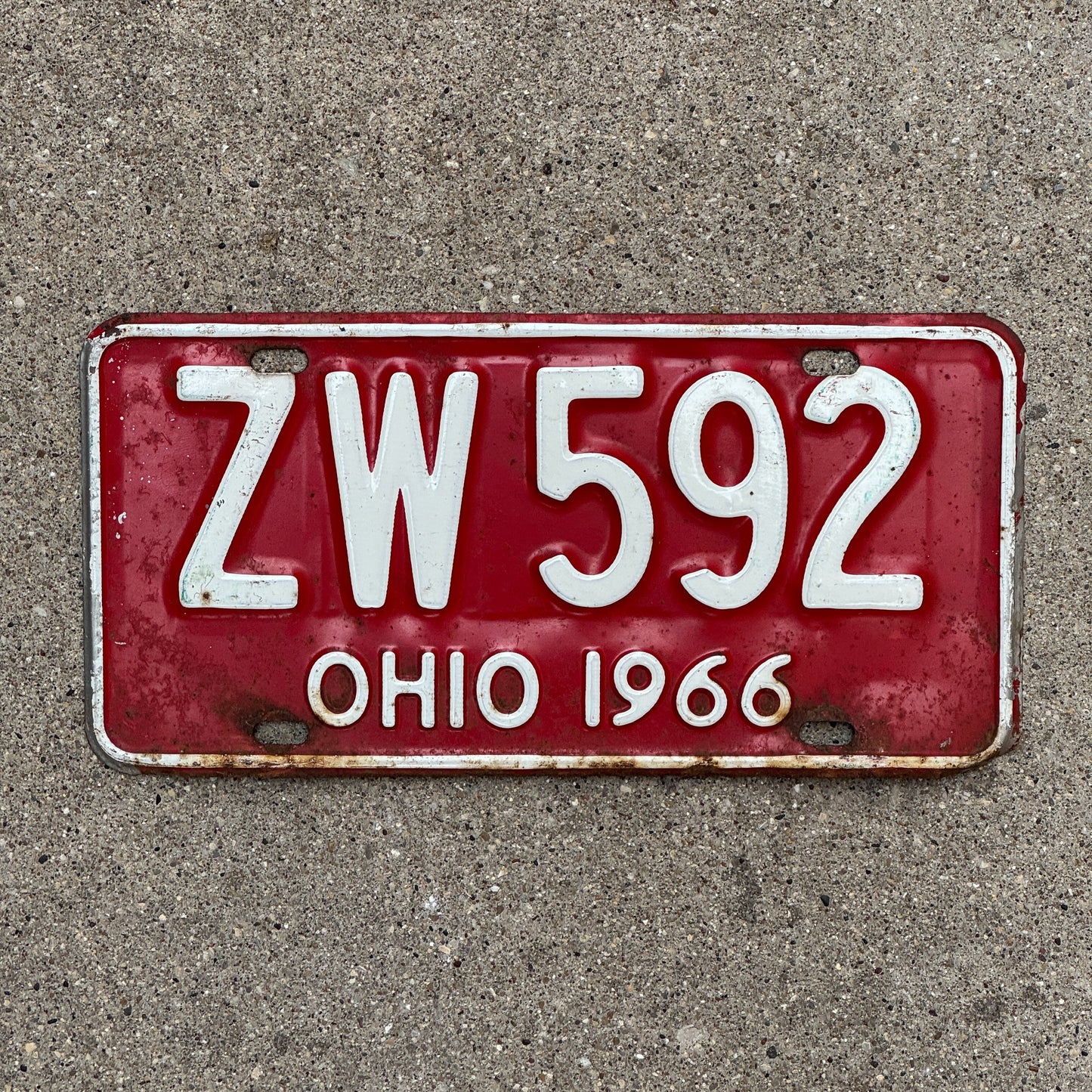 Photo of a 1966 Ohio License Plate Auto Tag Garage Decor Vintage ZW 592 with original patina
