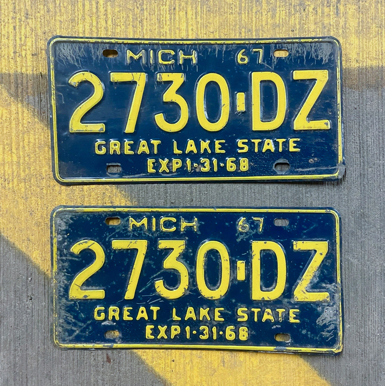 Photo of a 1967 1968 Michigan Truck License Plate Pair Auto Tag Garage Decor Vintage 2730 DZ with original patina