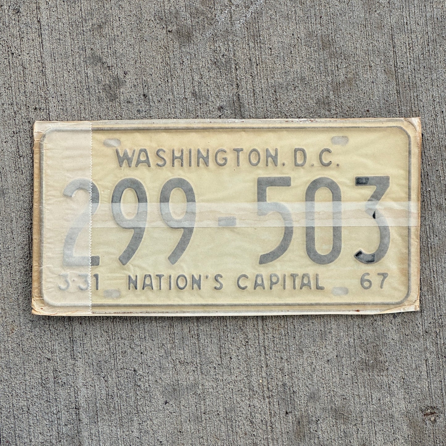 Photo of a 1967 1968 Washington DC License Plate Pair Auto Tag Garage Decor Vintage with Envelope 299 503 with original patina
