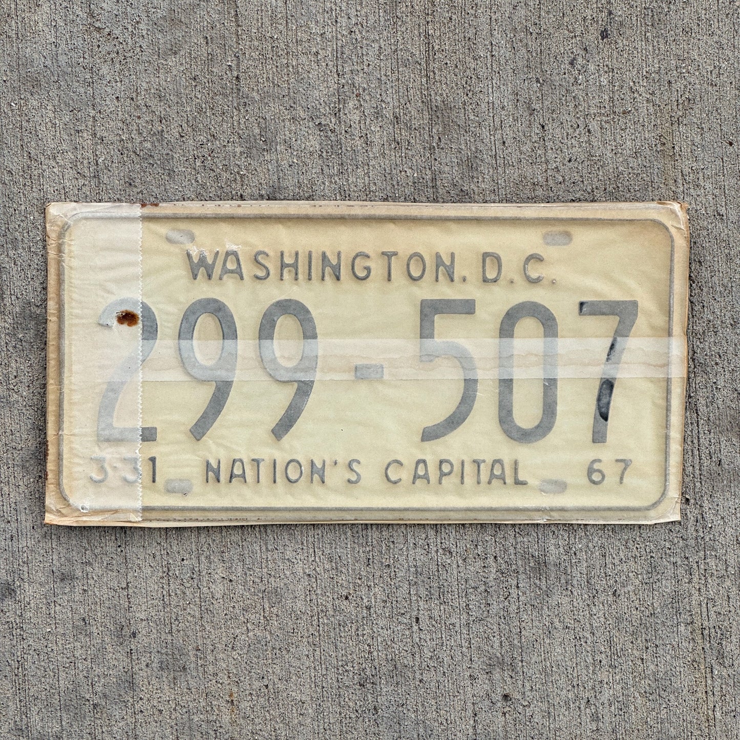 Photo of a 1967 1968 Washington DC License Plate Pair Auto Tag Garage Decor Vintage with Envelope 299 507 with original patina