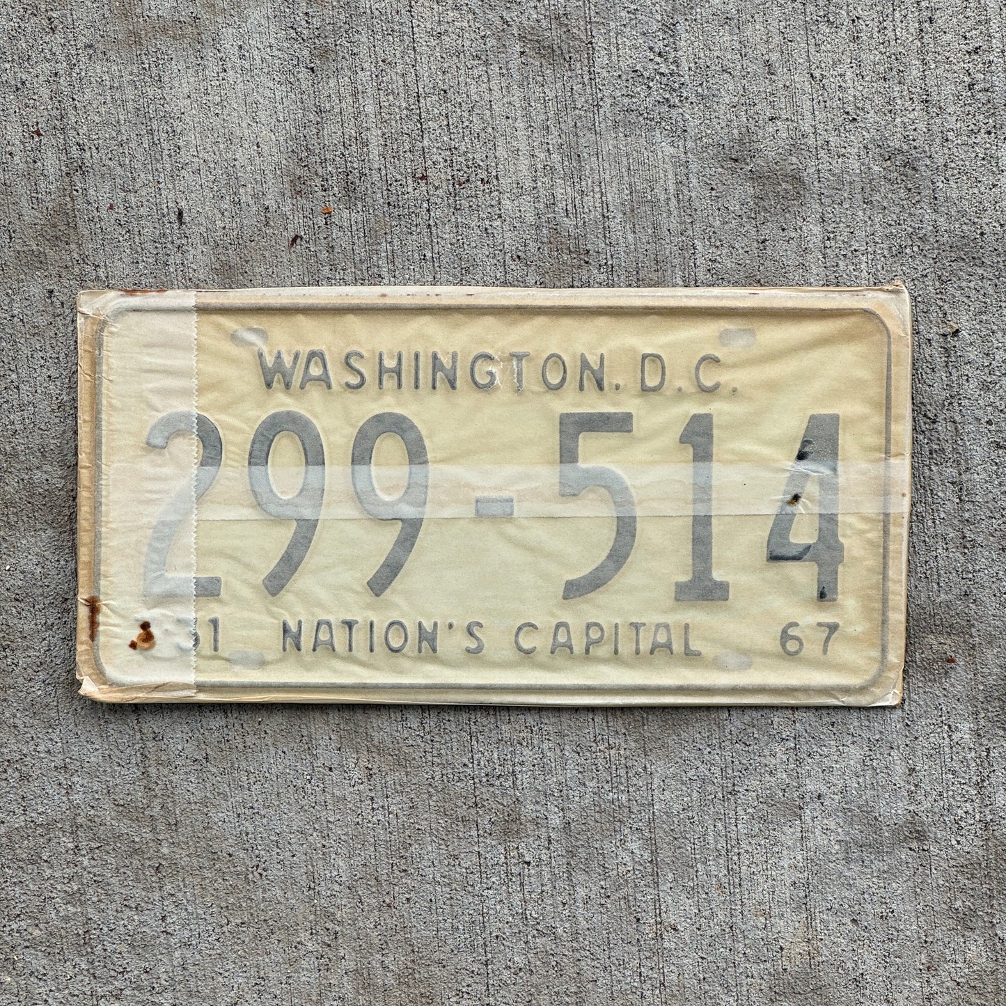 Photo of a 1967 1968 Washington DC License Plate Pair Auto Tag Garage Decor Vintage with Envelope 299 514 with original patina