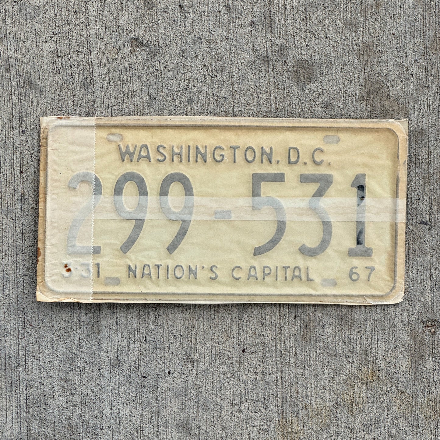 Photo of a 1967 1968 Washington DC License Plate Pair Auto Tag Garage Decor Vintage with Envelope 299 531 with original patina