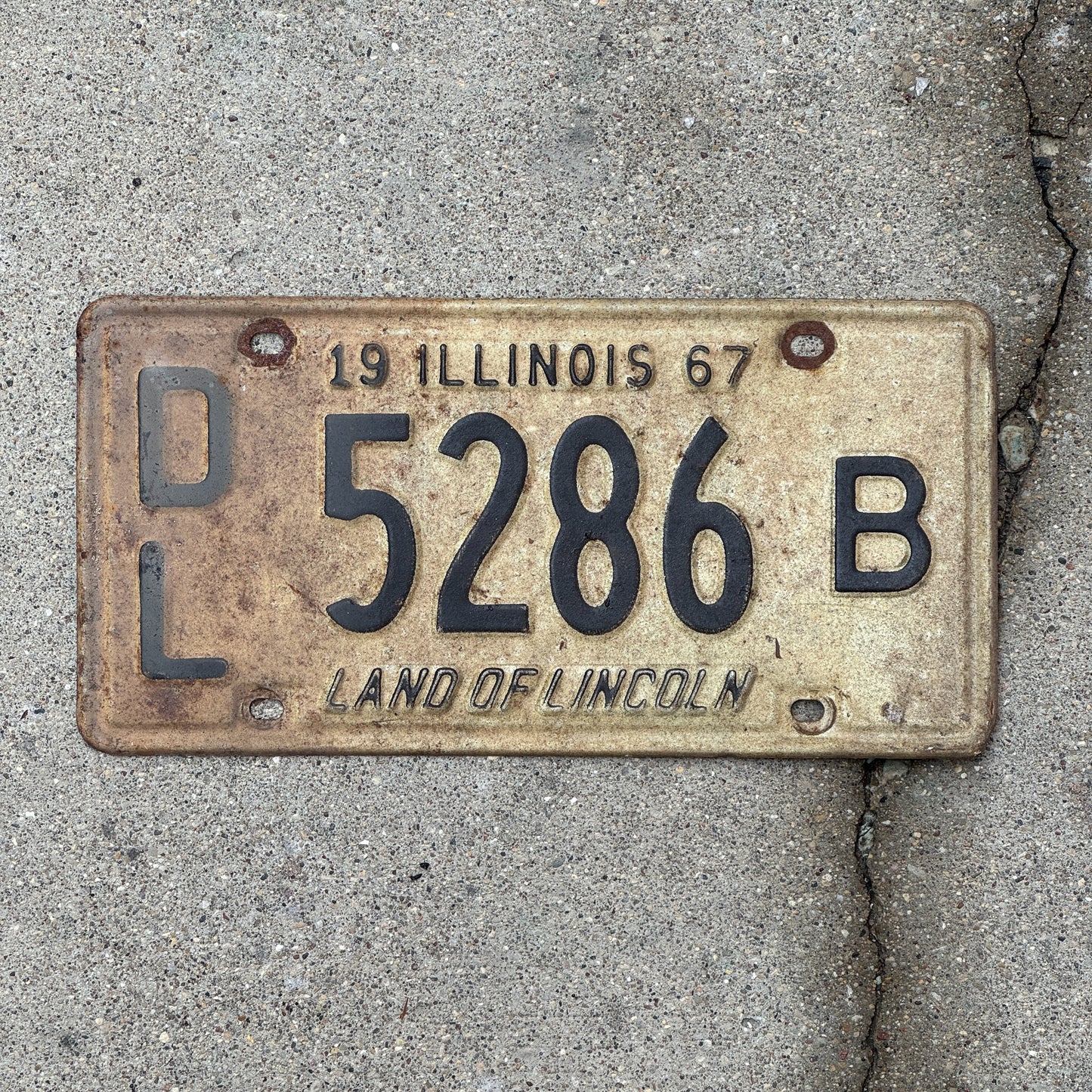 Photo of a 1967 Illinois Dealer License Plate Auto Tag 2 Vintage Garage 5286 B with original patina