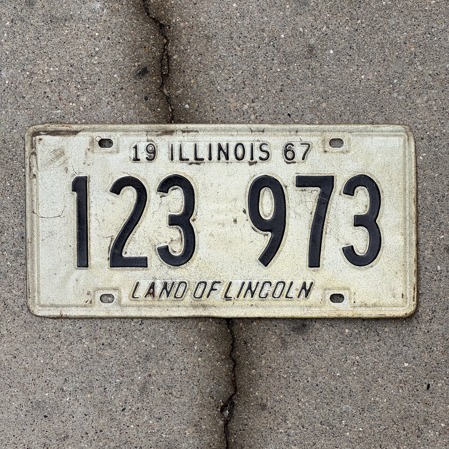 Photo of a 1967 Illinois License Plate Auto Tag 1 Vintage Garage 123 973 with original patina