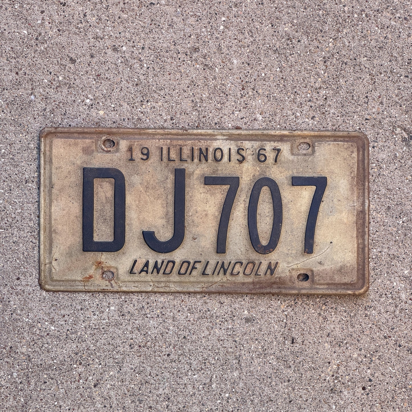 Photo of a 1967 Illinois License Plate Auto Tag 1 Vintage Garage DJ 707 with original patina