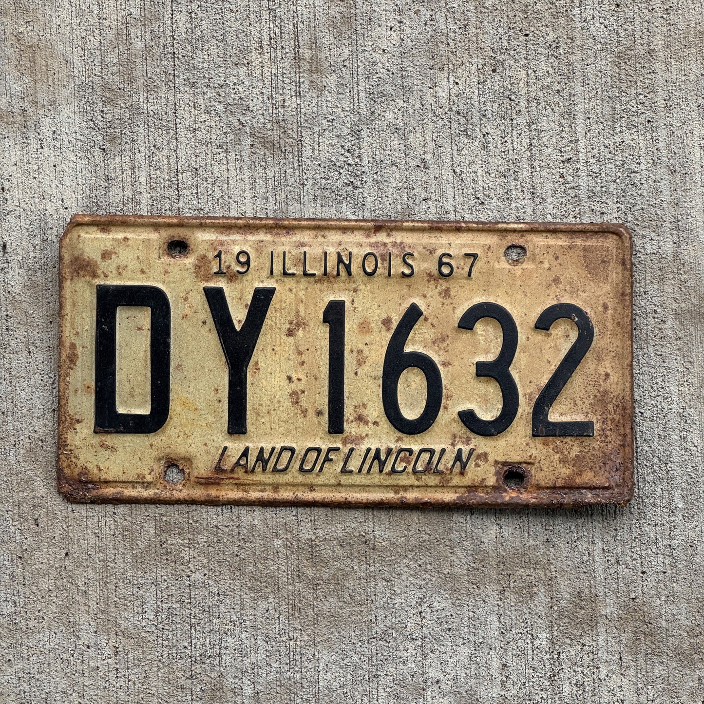 Photo of a 1967 Illinois License Plate Auto Tag 1 Vintage Garage DY 1632 with original patina