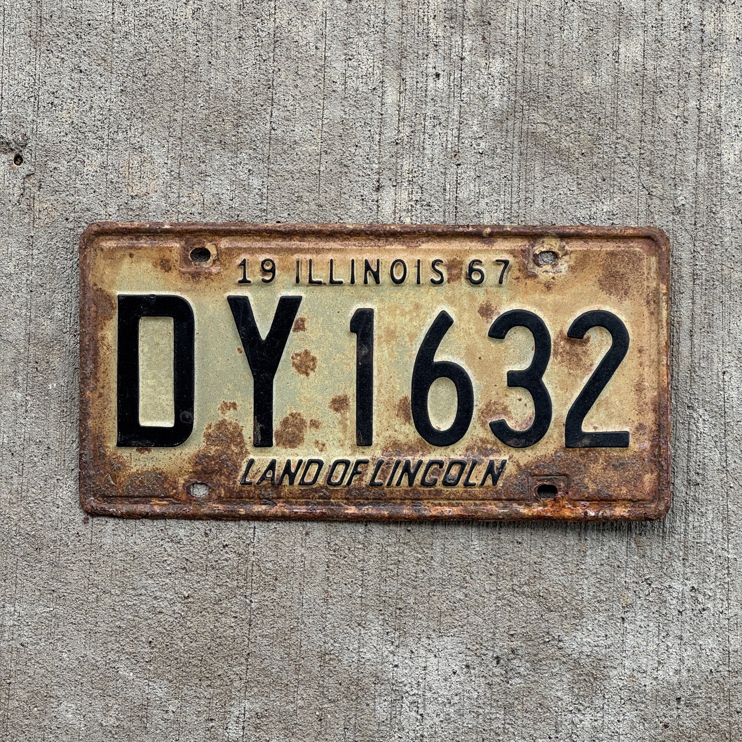 Photo of a 1967 Illinois License Plate Auto Tag 2 Vintage Garage DY 1632 with original patina