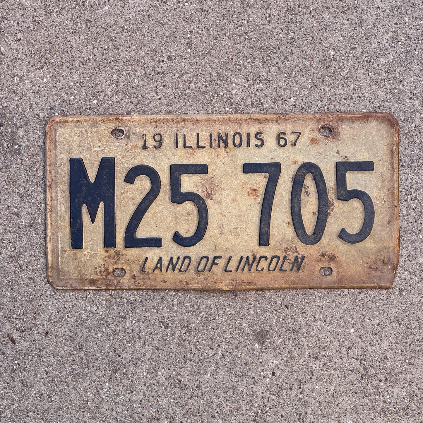 Photo of a 1967 Illinois Municipal License Plate Auto Tag 2 Vintage Garage M 25 705 with original patina