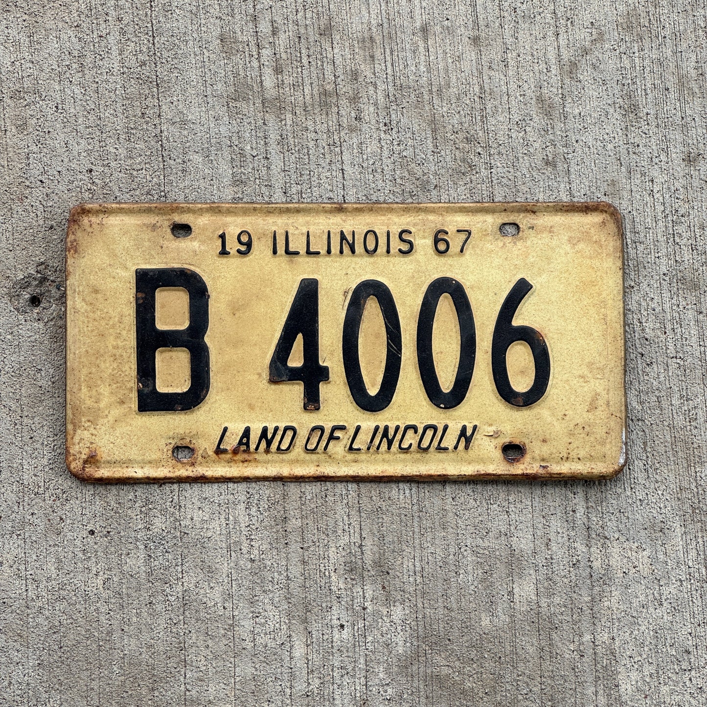 Photo of a 1967 Illinois Truck License Plate Auto Tag 2 Vintage Garage B 4006 with original patina