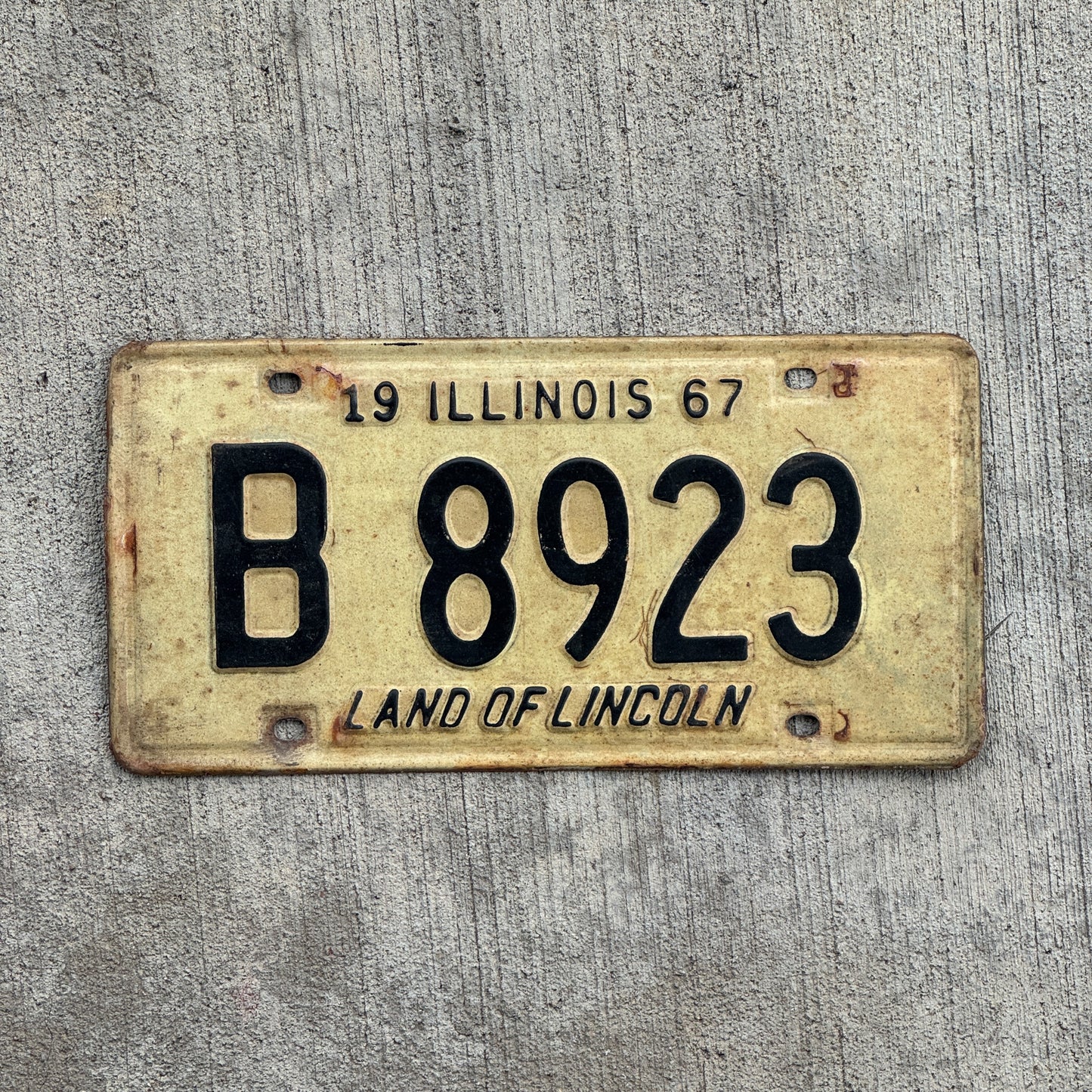 Photo of a 1967 Illinois Truck License Plate Auto Tag 2 Vintage Garage B 8923 with original patina