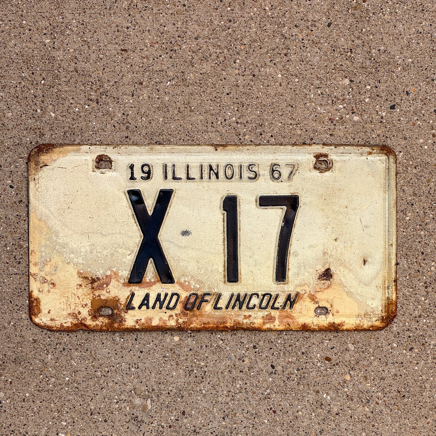 Photo of a 1967 Illinois Truck License Plate Auto Tag Garage Decor Vintage Low Number Two Digit X 17 with original patina