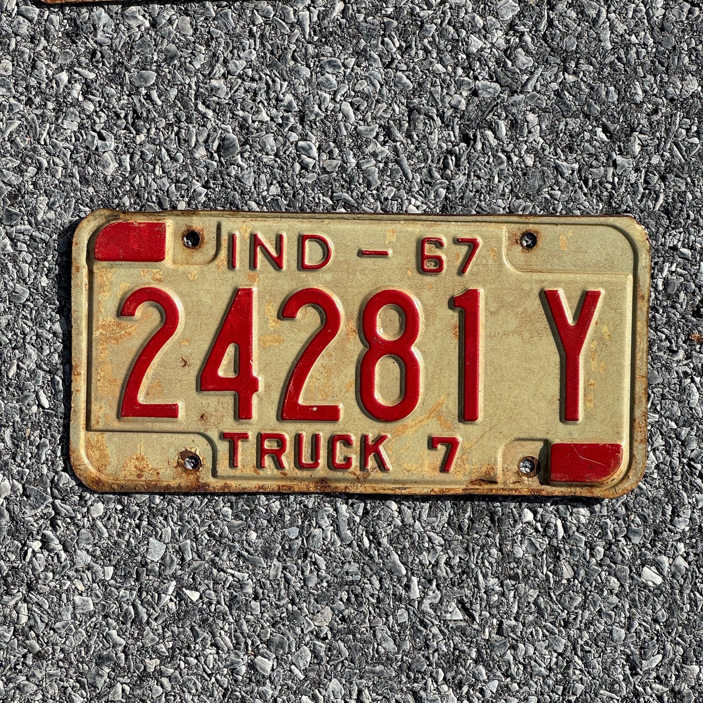 Photo of a 1967 Indiana Truck License Plate Auto Tag Garage Decor Vintage 24281Y