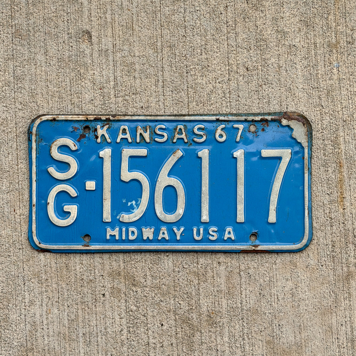 Photo of a 1967 Kansas License Plate Auto Tag Garage Decor Vintage SG 156117 with original patina