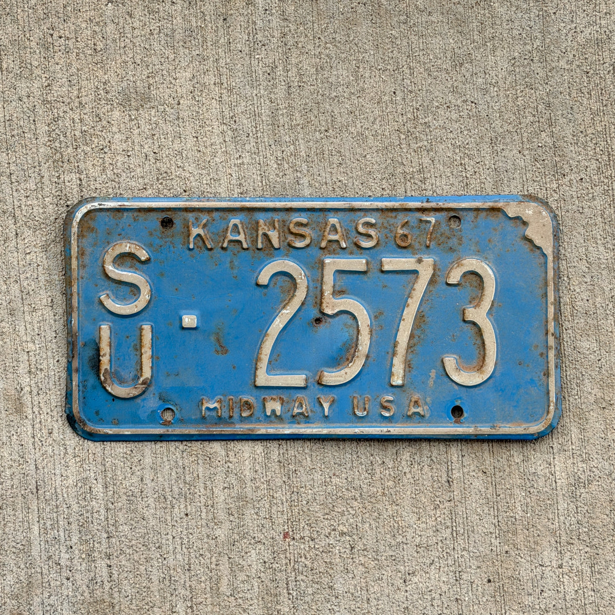 Photo of a 1967 Kansas License Plate Auto Tag Garage Decor Vintage SU 2573 with original patina