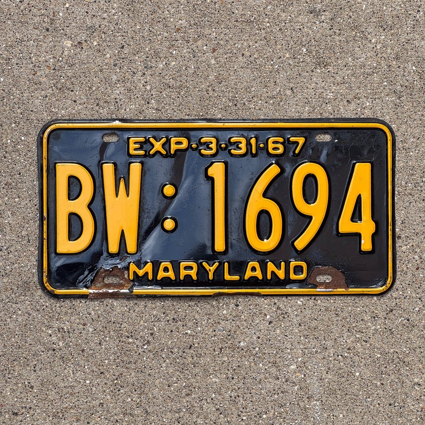 Photo of a 1967 Maryland License Plate Auto Tag Garage Decor Vintage BW 1694