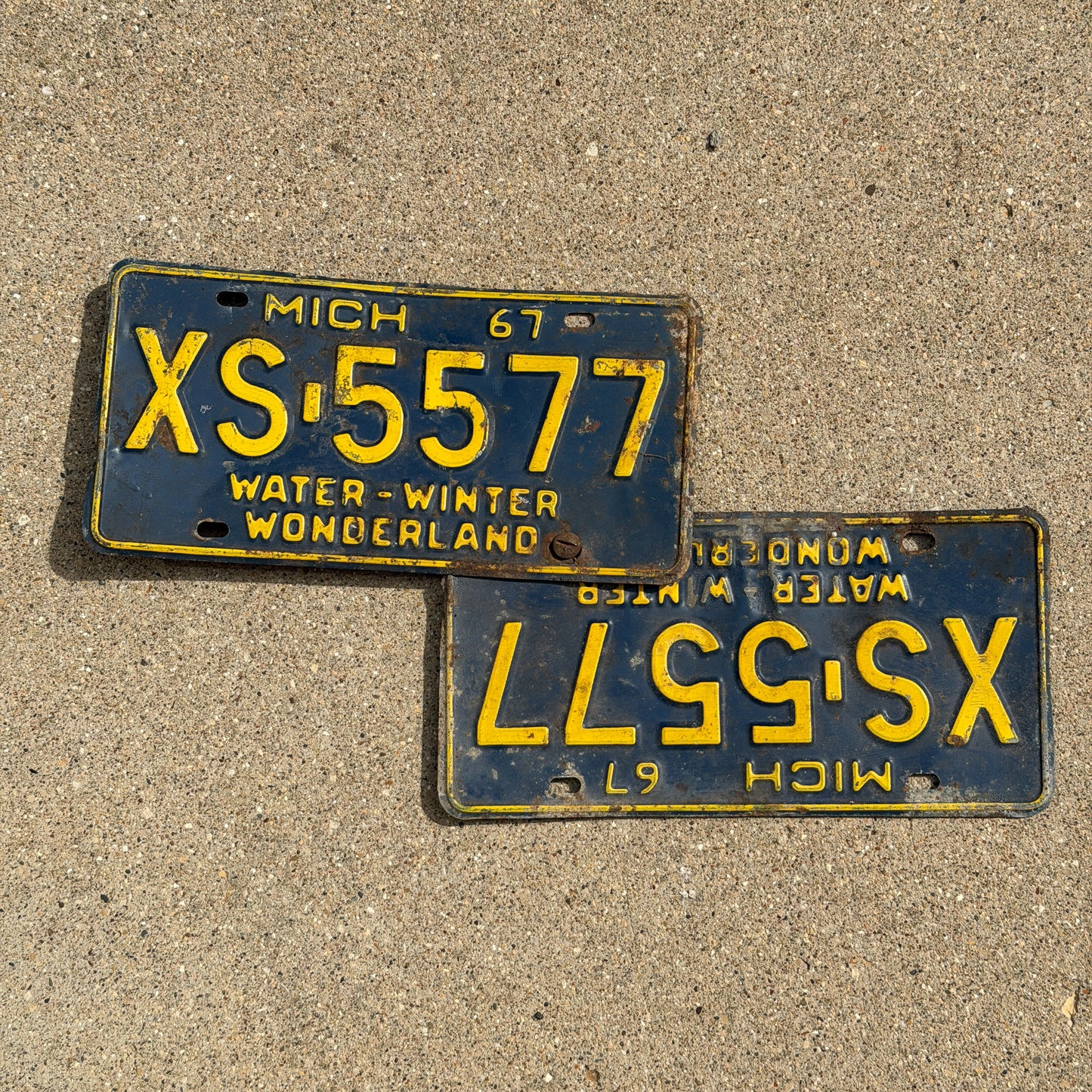 Photo of a 1967 Michigan License Plate Pair Auto Tag Garage Decor Vintage XS 5577 with original patina