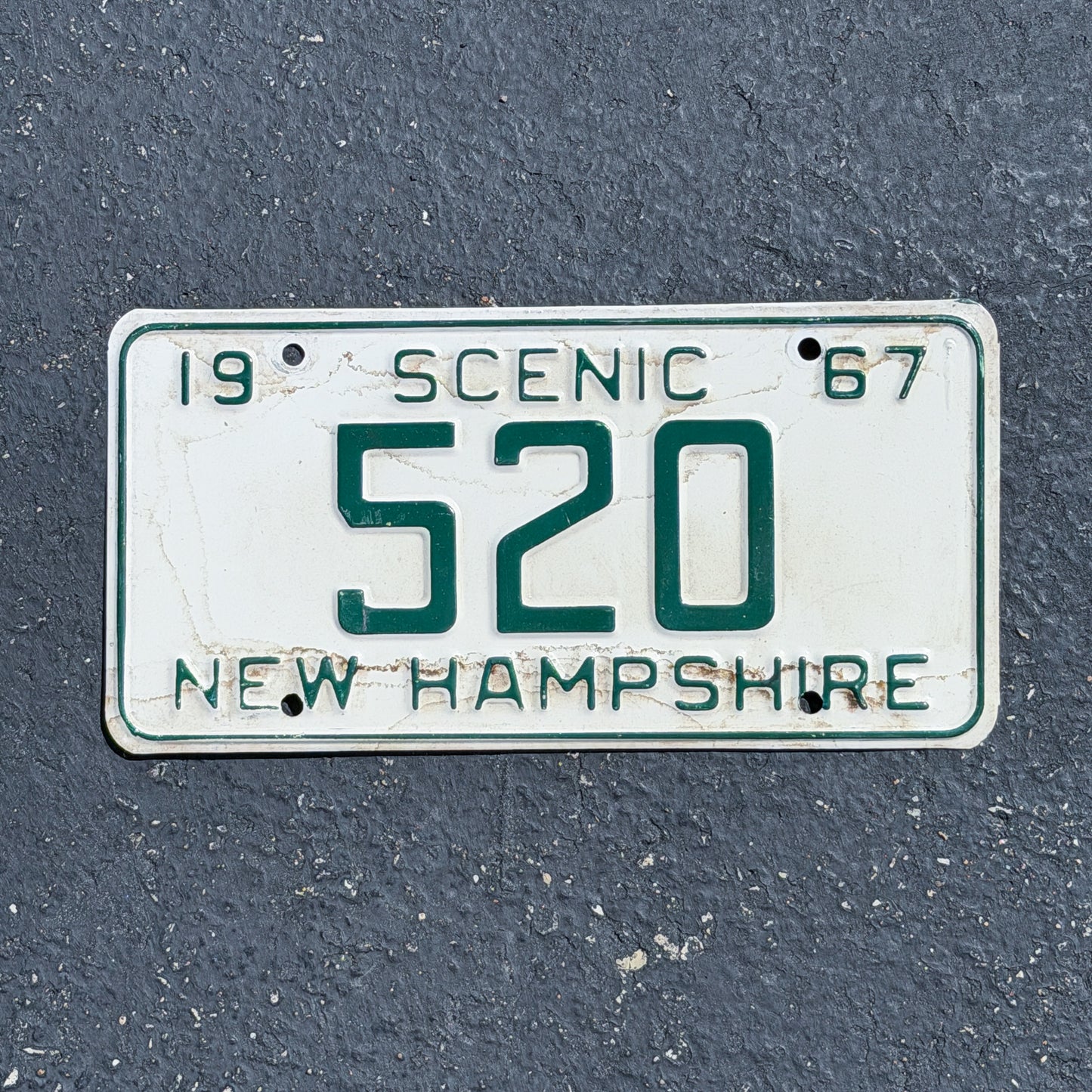 Photo of a 1967 New Hampshire License Plate Auto Tag Garage Decor Vintage Low Number Three Digit 520 with original patina