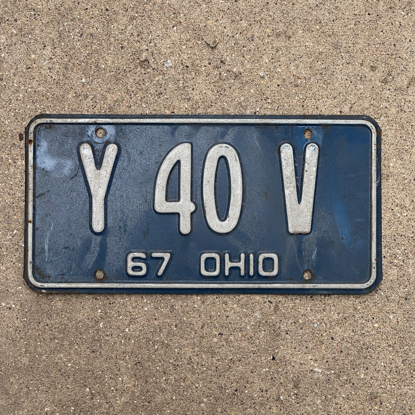 Photo of a 1967 Ohio License Plate Auto Tag 2 Vintage Garage Y 40 V with original patina