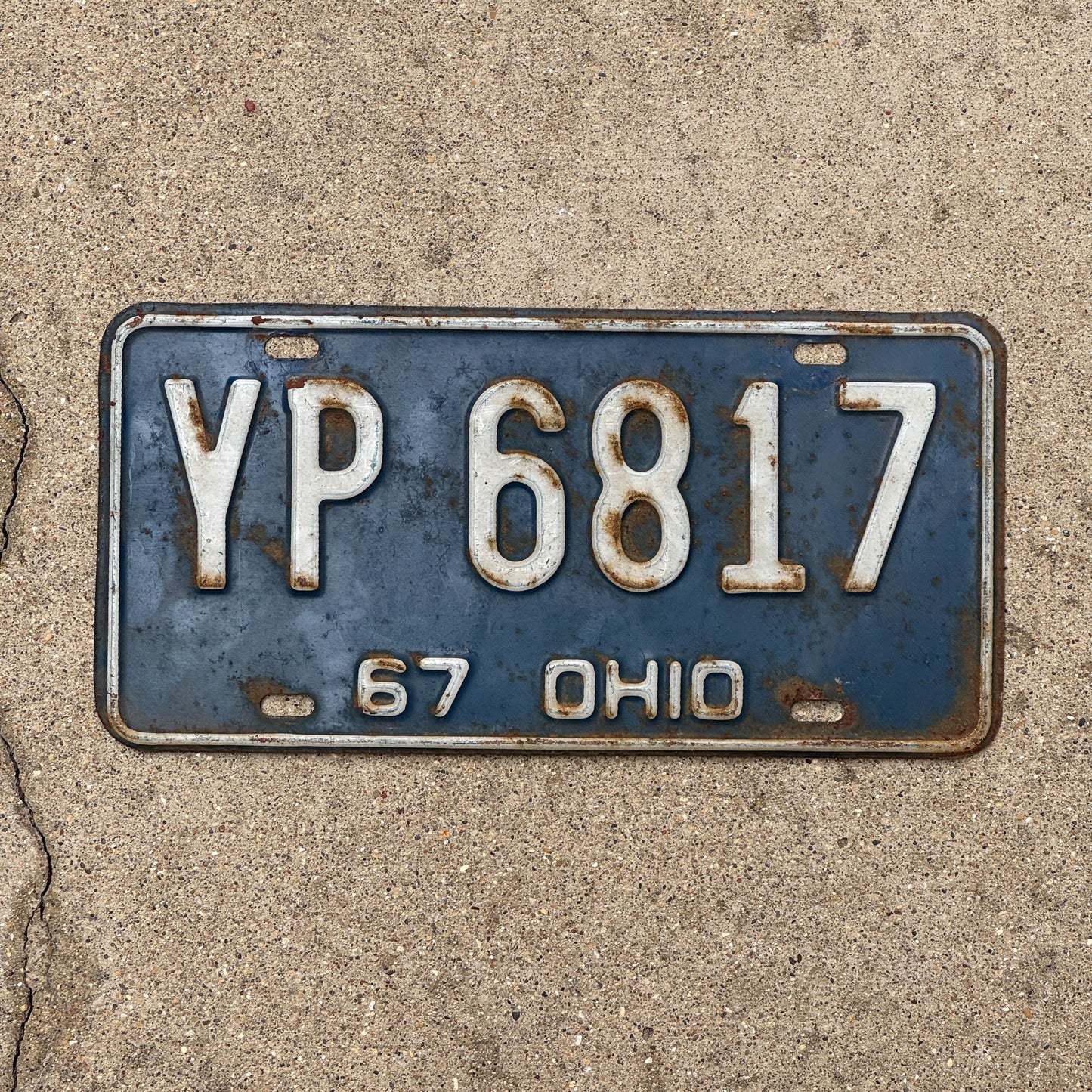 Photo of a 1967 Ohio License Plate Auto Tag Garage Decor Vintage YP 6817 with original patina