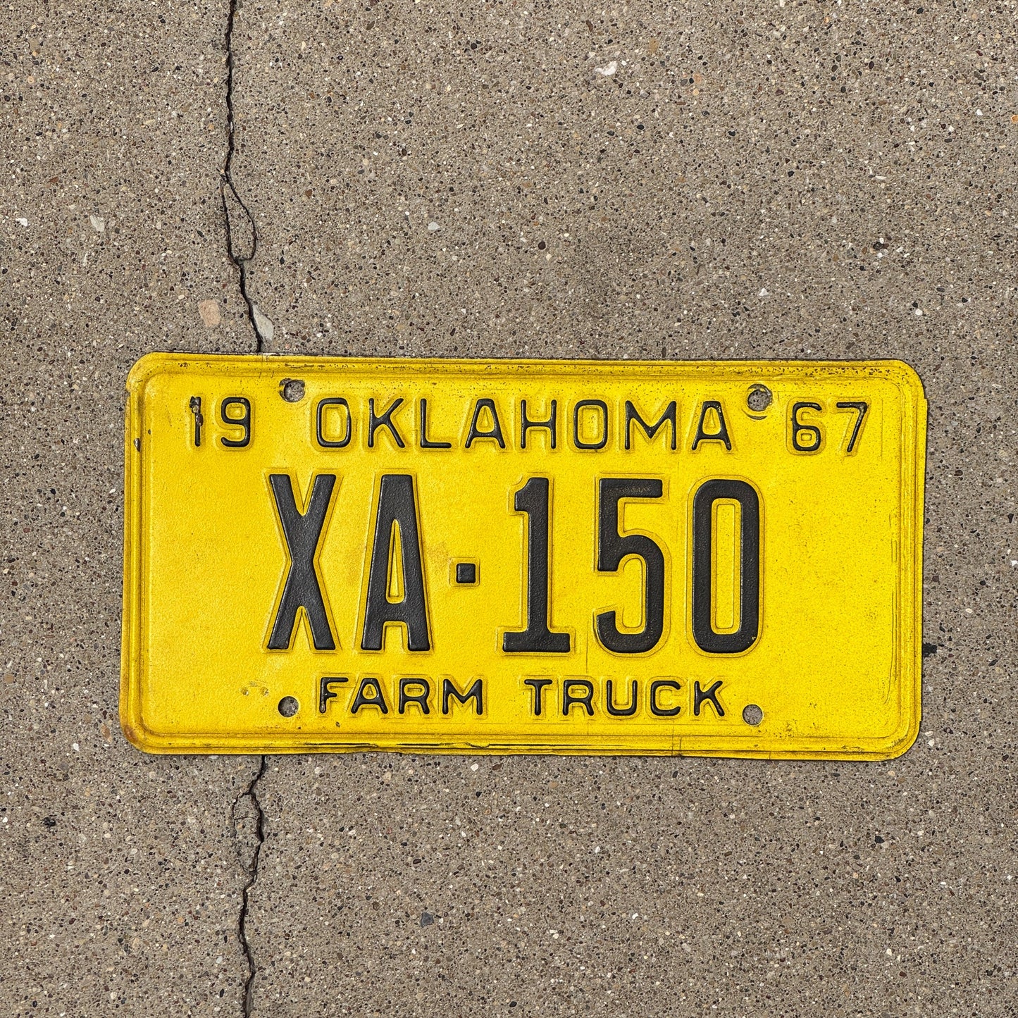 Photo of a 1967 Oklahoma Farm Truck License Plate Auto Tag Garage Decor Vintage XA 150