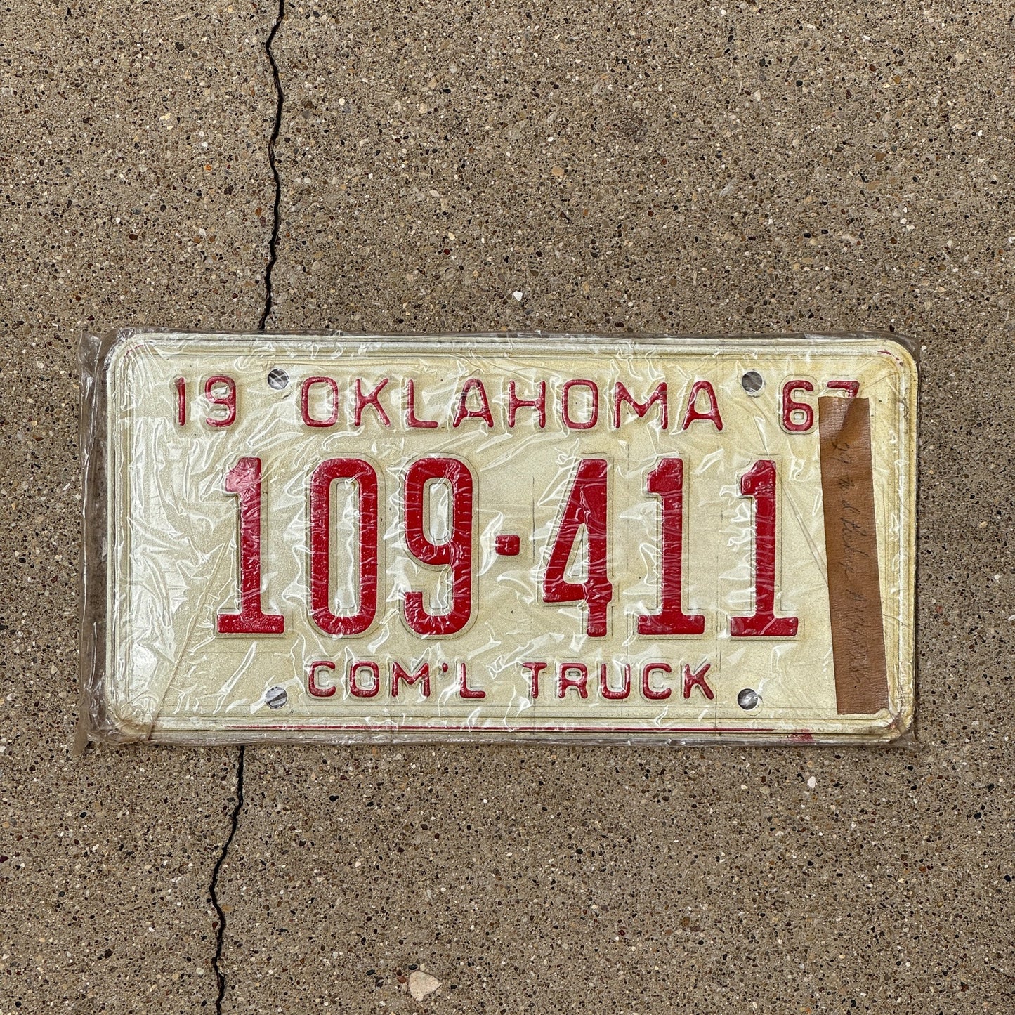 Photo of a 1967 Oklahoma Truck License Plate Auto Tag Garage Decor Vintage 109 411